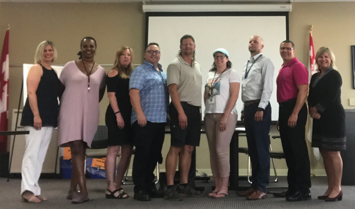 (From L to R): Roxanne Lepine, Karla Backer, Sylvia McDonnell, Rob Waddell, Russell Adrian, Alicia Walsh, Peter Lang, Aaron Billesberger, Catherine Gilbert.